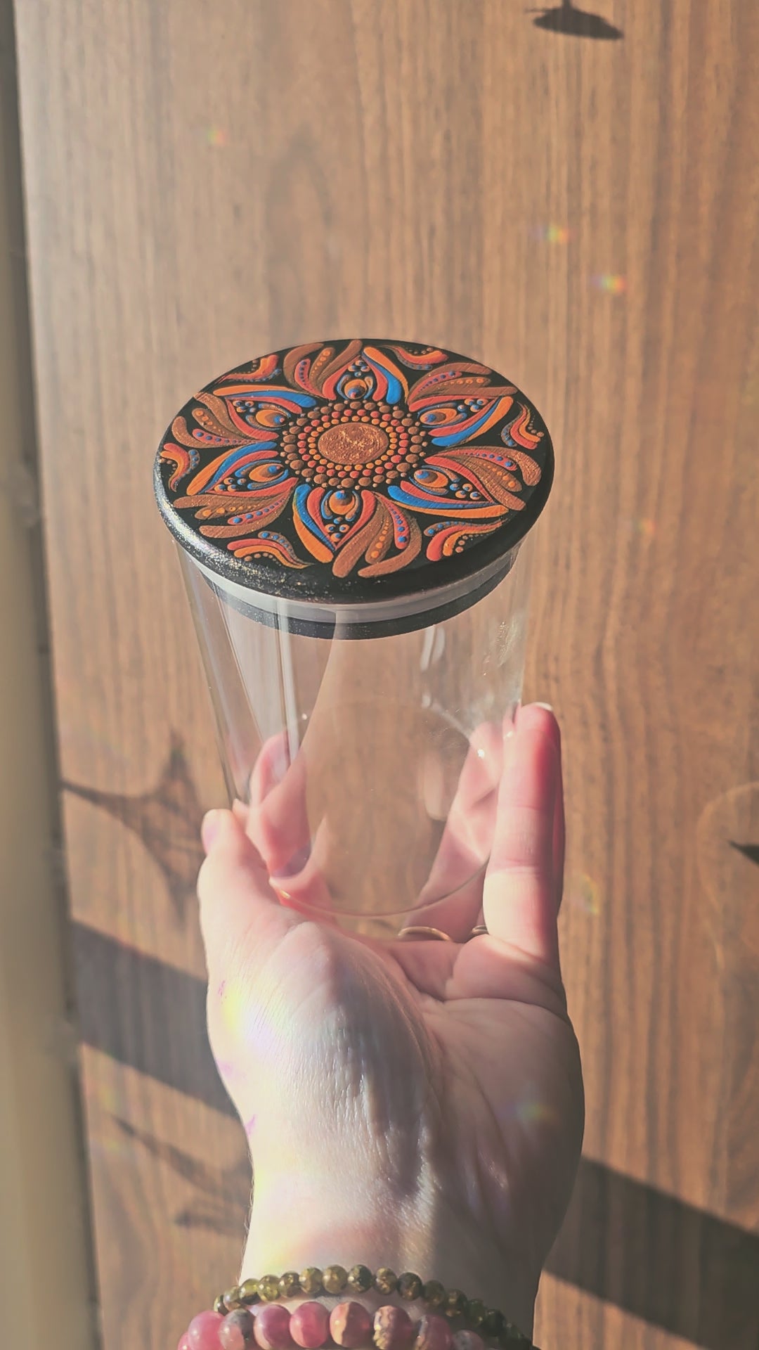 Glass bowl with wooden lid